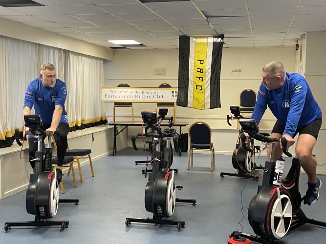 Lt Cdr Packer and Lt Cdr Cox undertake challenge to cycle 1 million metres in 50 hours