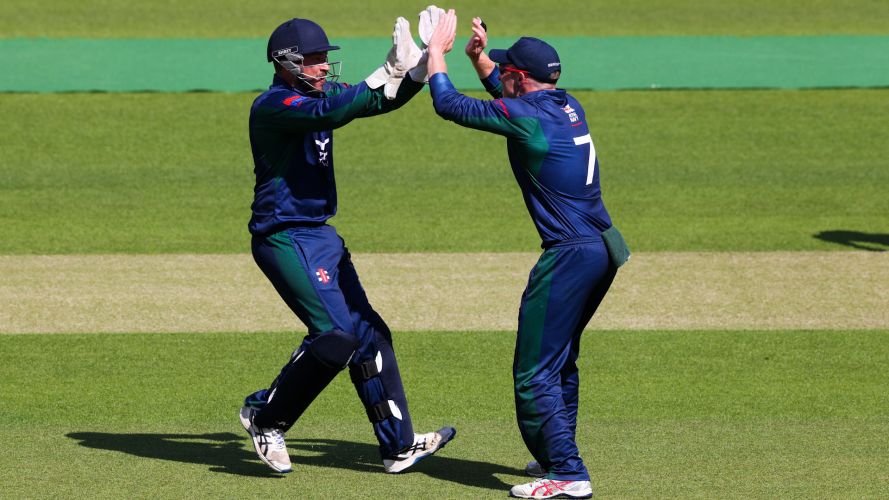 Navy fielders celebrate taking an Army wicket Credit Alligin Photography DATE 16062022.jpg 