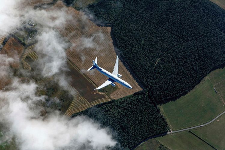 P-8A Poseidon over RAF Lossiemouth taken from above with a 100 sqn hawk from RAF Leeming 01092021 CREDIT MOD