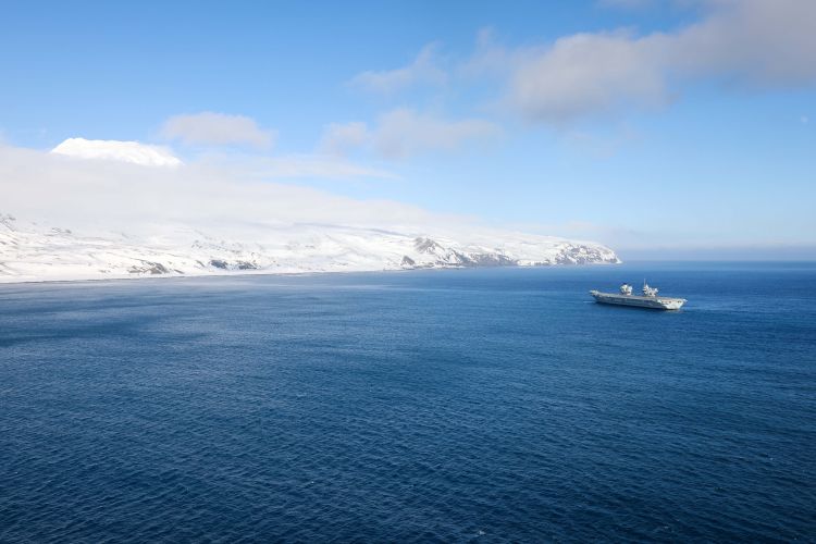 Panoramic view of the Norwegian volcanic island of Jan Mayen in the Arctic Ocean with HMS Prince of Wales near it 130422 CREDIT Royal Navy