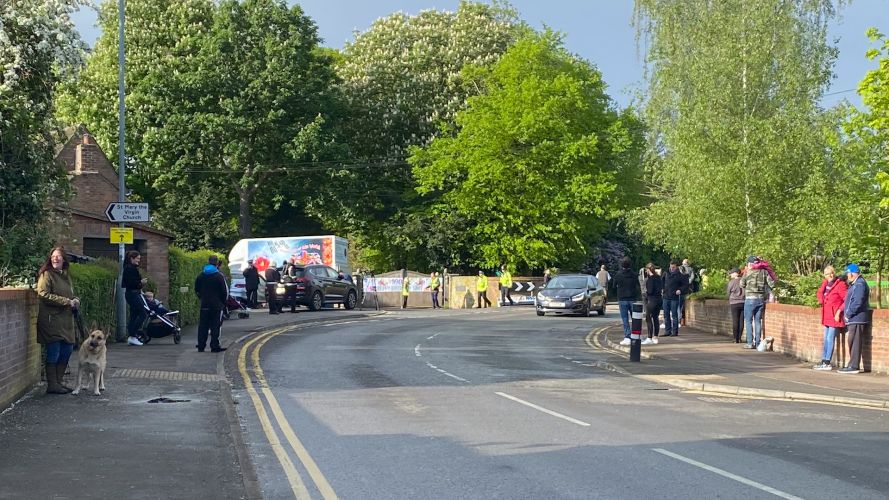 People in Captain Tom Moore's village clapped for his 100th birthday from safe distances because of the ongoing COVID-19 pandemic.