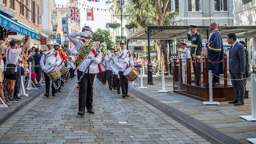 Personel salute whilst on parade to mark the occasion of the RAF being conferred the Freedom of the City by His Worship the Mayor of Gibraltar