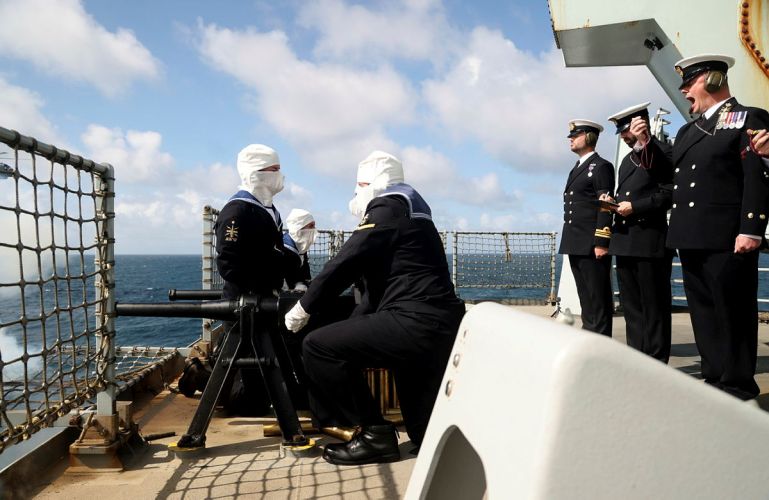 Personnel on board HMS Queen Elizabeth during the 86-gun salute to mark the death of the Queen (Picture: MOD).