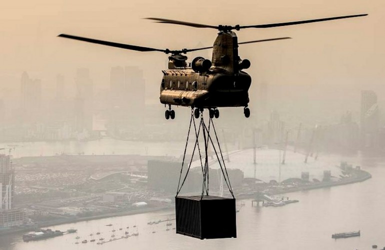 An RAF Odiham Chinook Helicopter with an underslung load over London