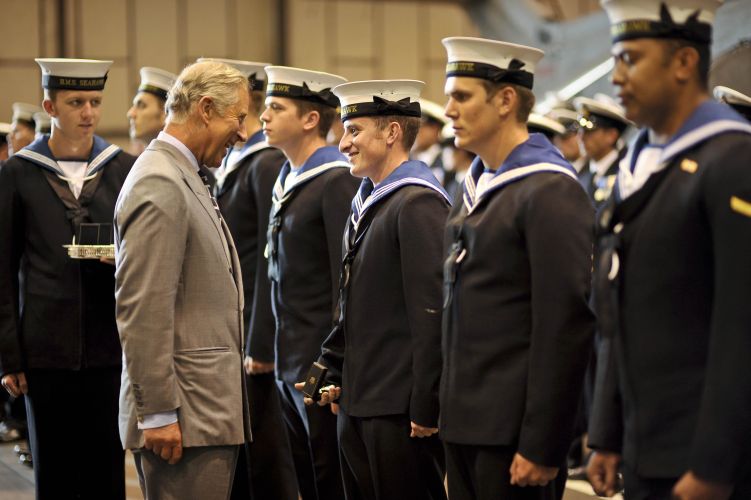 Prince Charles gives out Afghanistan campaign medals to Navy personnel in July 2010 (Picture: PA/ Alamy).