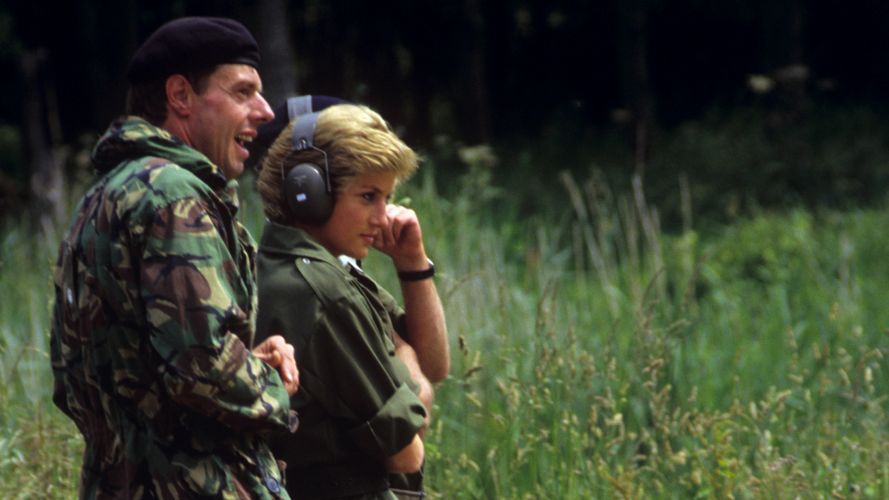 Princess Diana wearing ear defenders during a visit to 13th/18th Royal Hussars in 1988 (Picture: PA Images/Alamy)