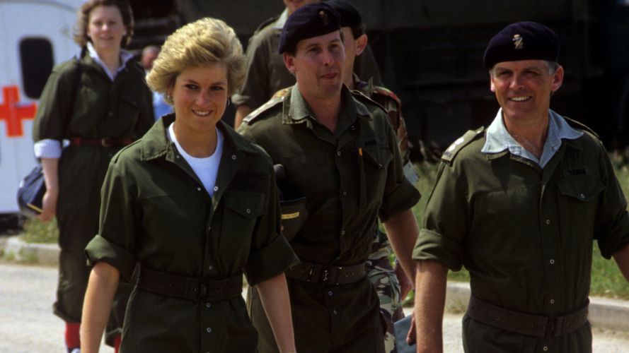 Princess Diana donning khaki overalls during a visit to 13th/18th Royal Hussars in 1988 (Picture: PA Images/Alamy)