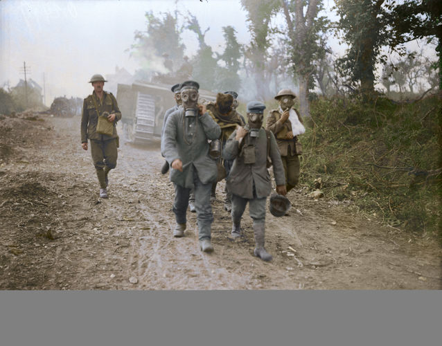 Prisoners bring in wounded wearing gas in August 1918 (Picture: The Vimy Foundation).