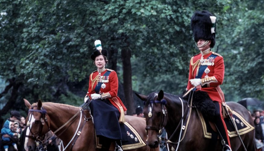 The Queen and Prince Philip during the 1963 Trooping the Colour (Picture: Michele and Tom Grimm/Alamy).