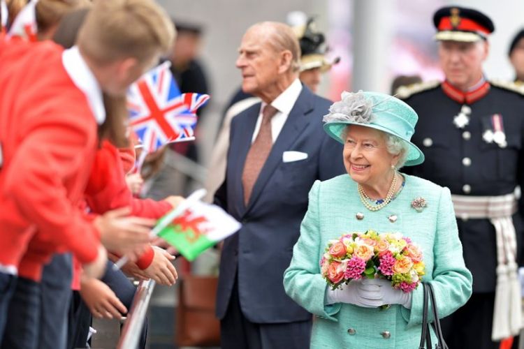The Queen welcomed to Cardiff by schoolchildren and a 21-gun royal salute to open the fifth Assembly at the Senedd, June 2016 (Picture: MOD). Queen welcomed to Cardiff by schoolchildren and a 21-gun royal salute to open the fifth Assembly at the Senedd, June 2016 (Picture: MOD).