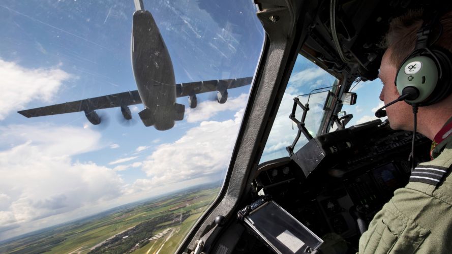 RAF C-17 Globemaster flying close formation with LXX 30 Squadron A400M during QPJ Flypast Practise 24052022 CREDIT MOD Crown Copyright.jpg
