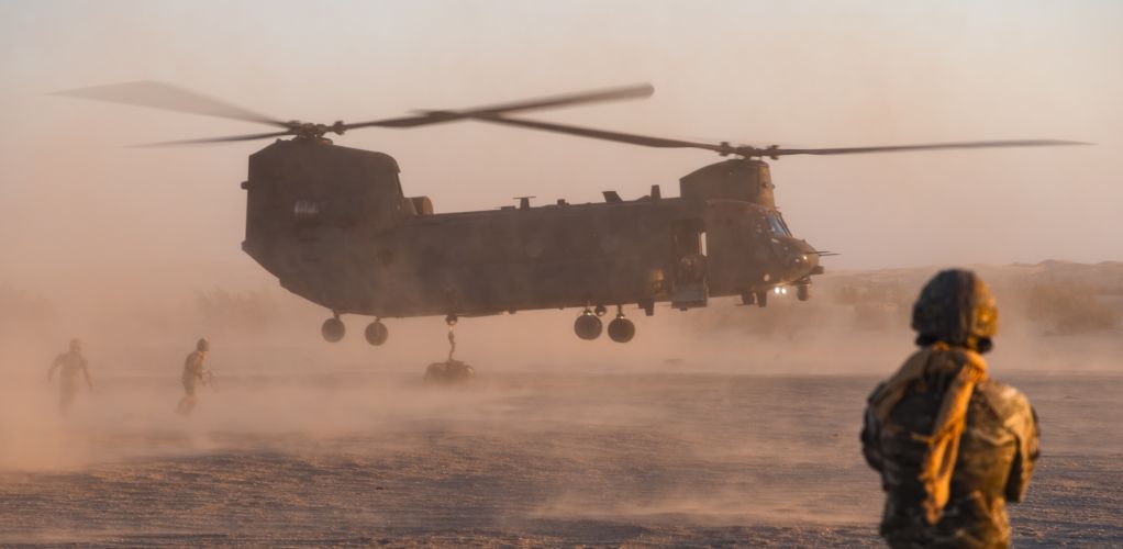 Joint Helicopter Support Squadron (JHSS) personnel underneath an RAF Chinook whilst deployed in California