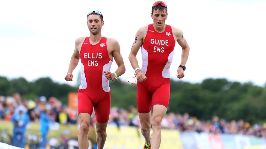 RAF Luke Pollard guiding David Ellis in the Commonwealth Games 2022 para-triathlon and they took gold 31072022 CREDIT MOD Crown Copyright.jpg