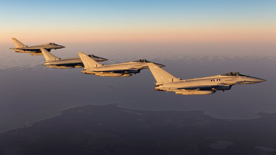 RAF Typhoons from RAF Lossiemouth flying alongside German Air Force Eurofighters over Eastern Europe