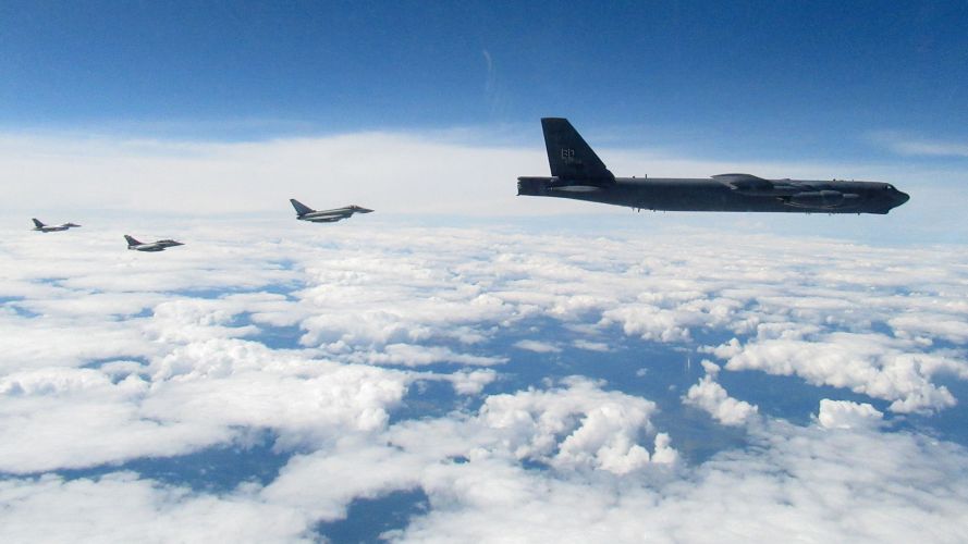 RAF Typhoons simulating an interception of a US B-52 during an exercise whilst deployed on NATO's Air Policing Mission in the Baltics