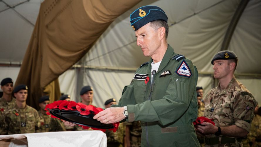 RAF personnel deployed on Ex Magic Carpet at the Air Exercise area in Oman offer respects Remembrance day 11112021 Credit RAF.jpg