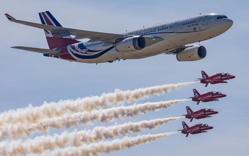The Red Arrows fly with the RAF's VIP Voyager 