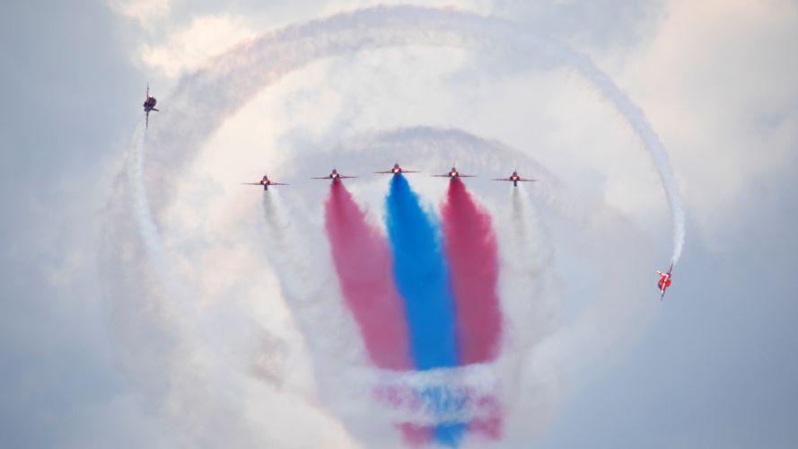 Red Arrows performing the Tornado, with Reds 1, 2, 3, 6, 7 and 4 and 5 rolling round 17052022 CREDIT MOD Crown Copyright.jpg