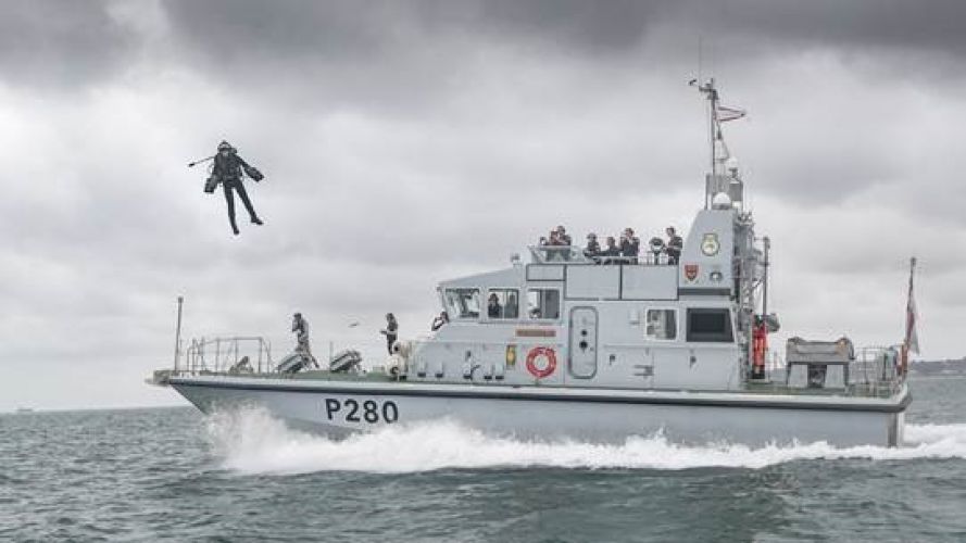 Rocket Man takes flight alongside the vessel (Picture: Royal Navy).