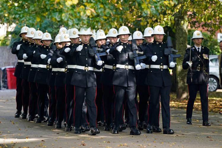 Royal Marines arrive for the funeral of Major General Matthew Holmes