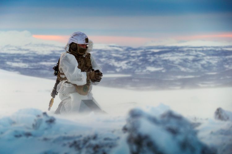 Royal Marines assault engineer of 45 Commando prepares a charge during ice demolition training in the Arctic Circle. Won the Global Operations Prize Stevie Burke 02102020 CREDIT ROYAL NAVY