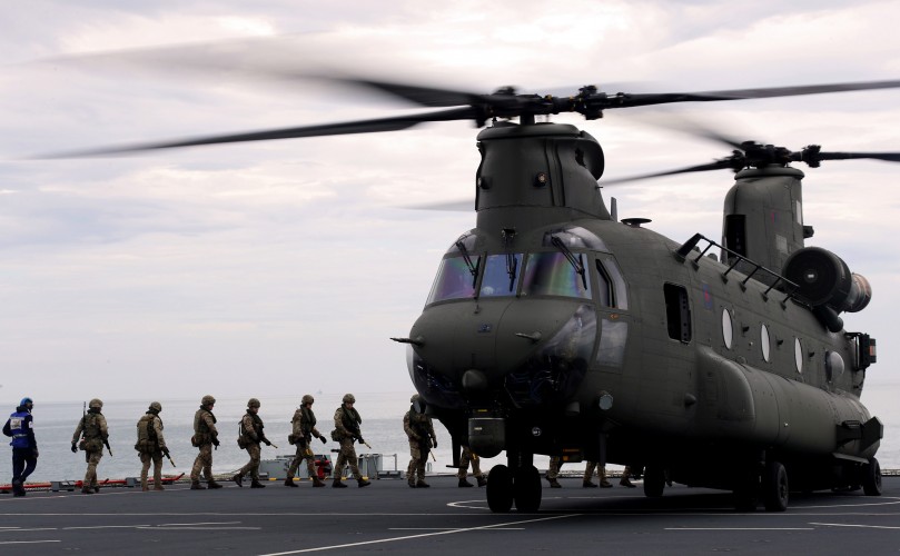 Royal Marines embarking a Chinook from RFA Lyme Bay during Ex Catamaran