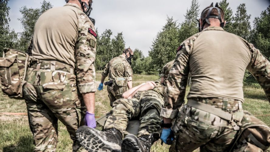 Royal Marines rush a casualty to treatment areas during the Royal Navy NATO exercise 05082022 CREDIT Royal Navy.jpg