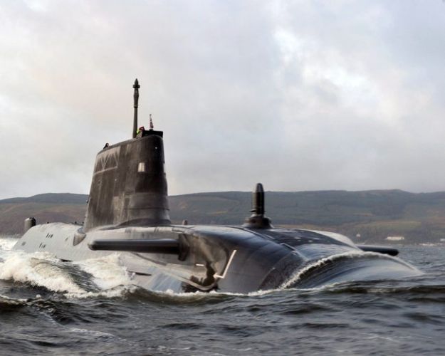 Royal Navy submarine HMS Astute sails up the Clyde estuary into her home port of Faslane, Scotland