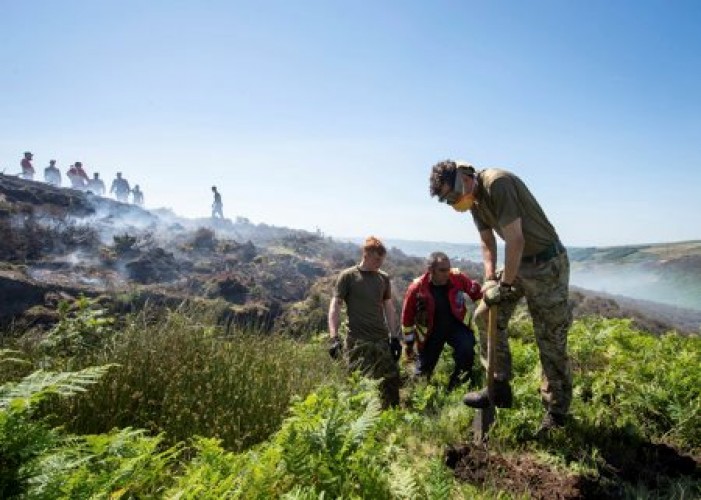 Army battle a wildfire on Saddleworth Moor
