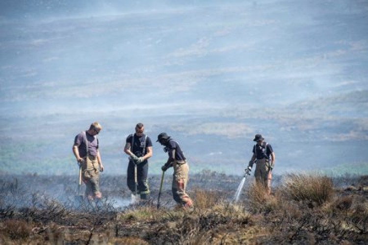 Army battle a wildfire on Saddleworth Moor