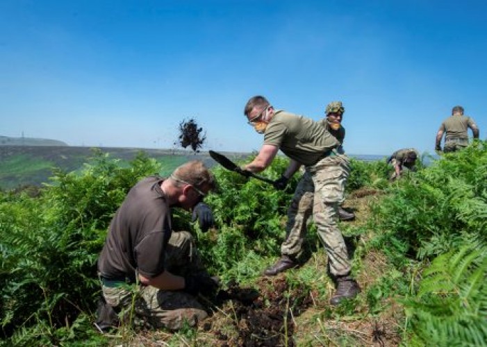 Army battle a wildfire on Saddleworth Moor