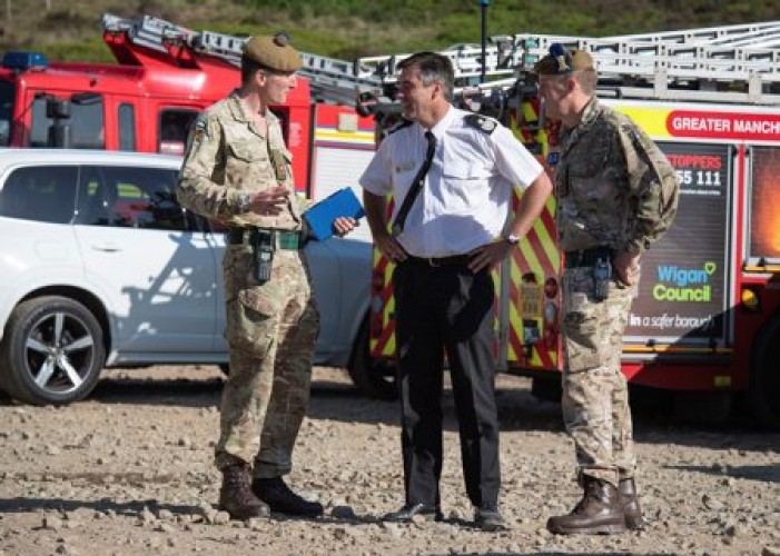 Army battle a wildfire on Saddleworth Moor