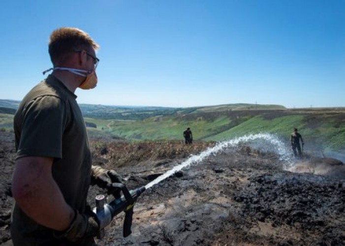 Army battle a wildfire on Saddleworth Moor