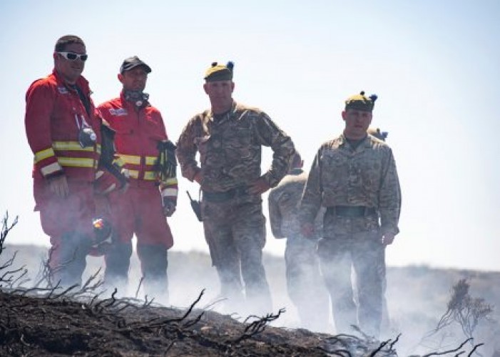 Army battle a wildfire on Saddleworth Moor