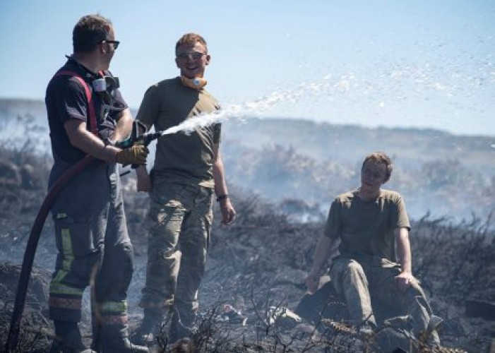 Army battle a wildfire on Saddleworth Moor
