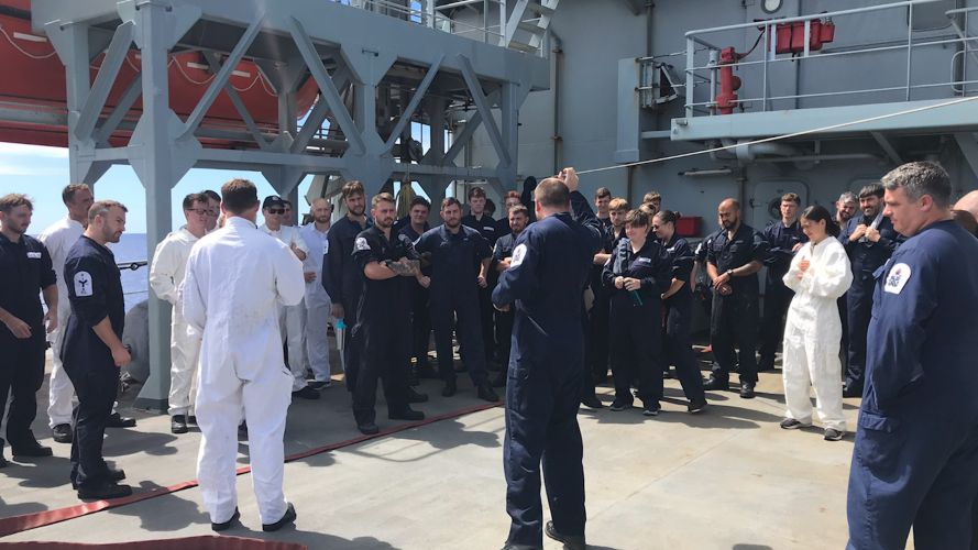 Sailors on board HMS Scott as they train to deal with fires and floods
