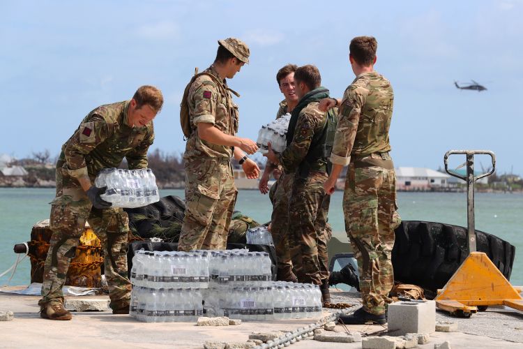Soldiers from the Humanitarian and Disaster Relief team from RFA Mounts Bay provide assistance in Great Abaco, Bahamas, after Hurricane Dorian CREDIT MOD 040919