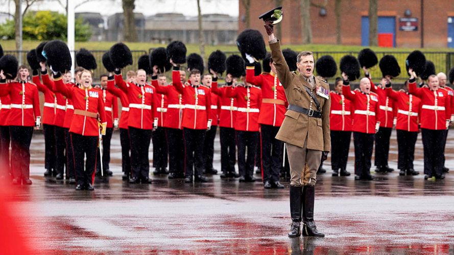 St Patrick’s Day parade with the Irish Guards in Mons Barracks raising their hats (Picture: MOD).