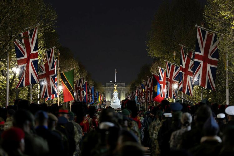 The Guards Division contingent of the Coronation procession rehearsing in London at night