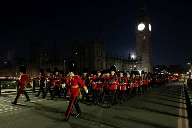 	The Guards Division contingent of the Coronation procession rehearsing in London at night