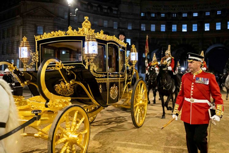 The Royal Carriage during the final full rehearsal, which took place at night, for the coronation of King Charles