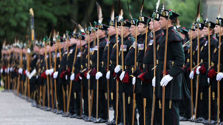 The Royal Company of Archers, (The King's Bodyguard for Scotland) part of The Tri-Service Guard of Honour (GoH) escorting the Crown Jewels procession