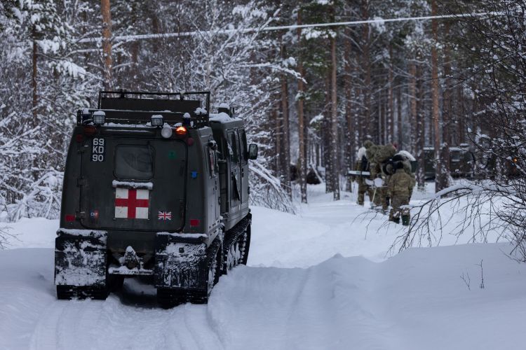 One of the vehicles used by the Commando Helicopter Force driving through the snow in Operation Clockwork (Picture: Royal Navy).