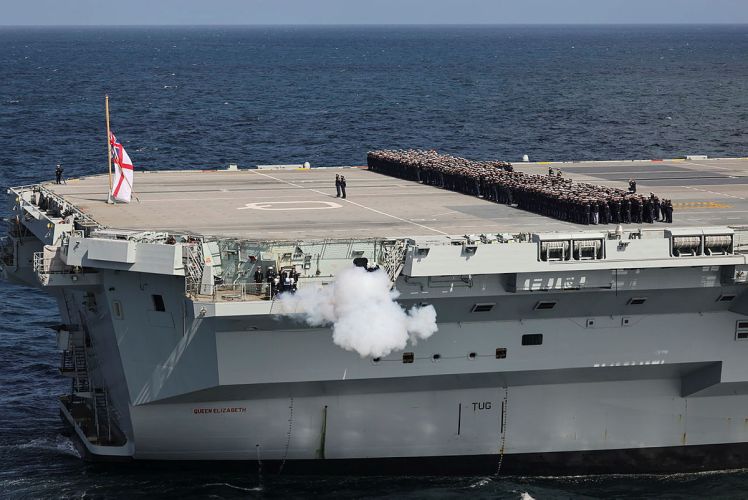 The Royal Navy's flagship HMS Queen Elizabeth carried out a 96 gun salute on the occasion of the passing of Her Majesty Queen Elizabeth II (Picture: MOD).