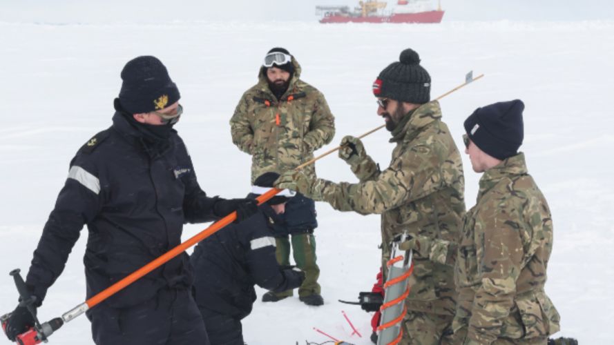 The team from HMS Protector surveys and researches the ice and oceans near the North Pole (Picture: Royal Navy).