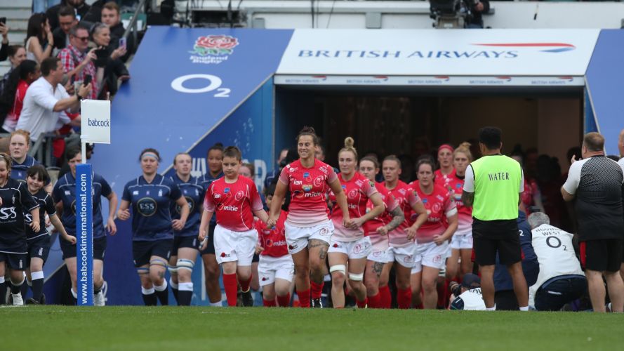 The women's team walk out on Twickenham for a historic first appearance. Credit Alligin Photography Date 30042022.jpg 