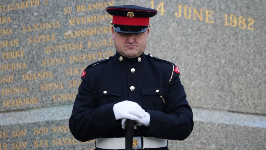 Tributes paid besides Liberation Monument in Stanley 14062022 CREDIT BFBS.JPG