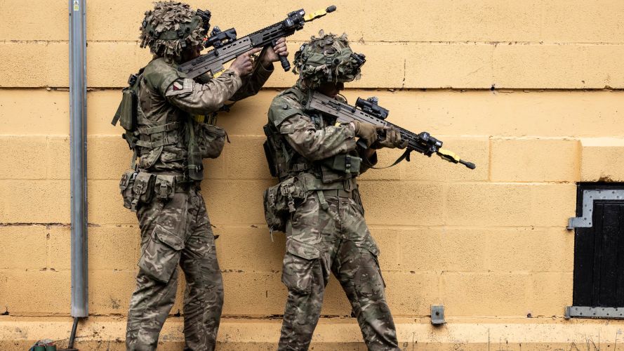 Two soldiers carry out building clearance drills on Exercise Iron Cyclone 27072023 CREDIT MOD.jpg