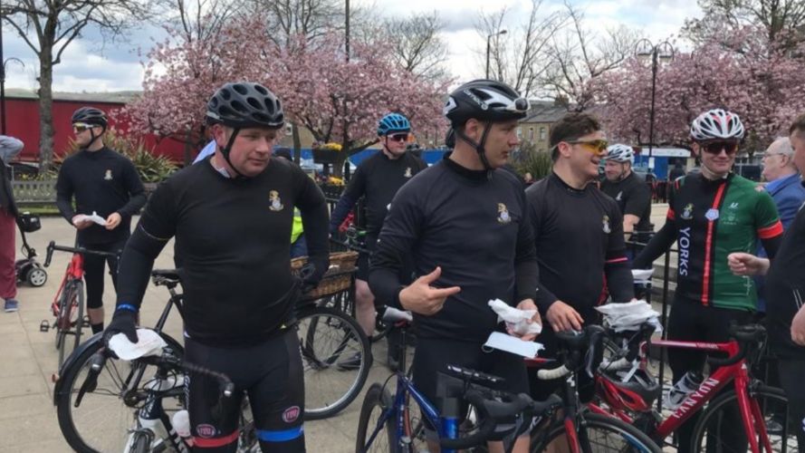 UK Armed Forces personnel cycling as part of the Captain Tom 100 Challenge (Picture: MOD).