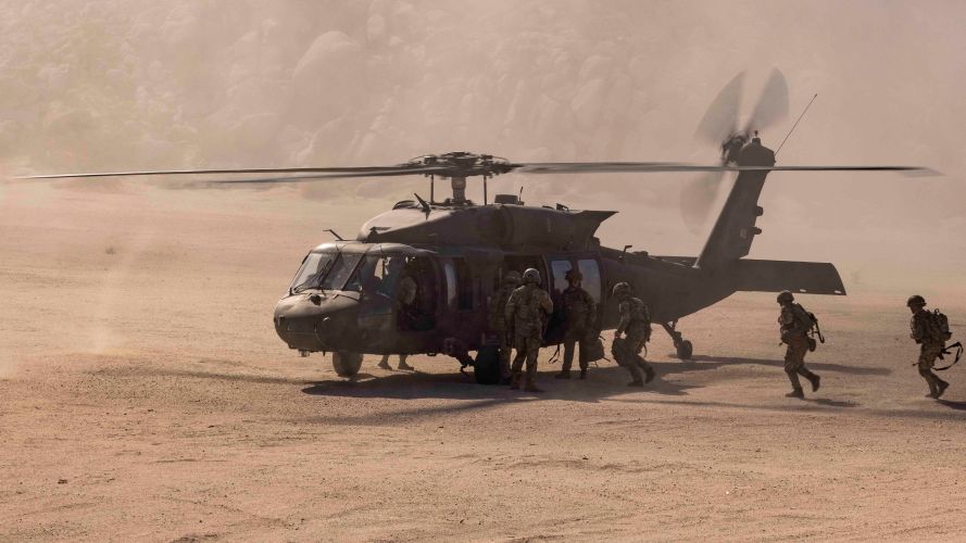 UK soldiers board a flight in with the US Sikorsky UH-60 Black Hawk during Project Convergence 27102022 MOD Crown Copyright.jpg